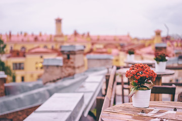 Cafe terrace on the roof top with beautiful view of Saint Peterburg old town.