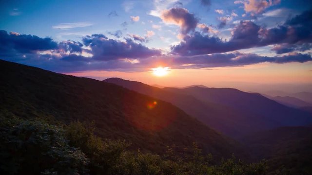 Dramatic pan of sunrise in the Blue Ridge Mountains of Asheville North Carolina