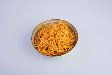 murukku or traditional indian snack chakli and chakali on background.