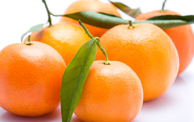 Ripe mandarin close-up on a white background. Tangerine orange. Colorful Food and drink still life concept. Fresh fruits. Clementine. Citrus. Diet. Vitamins. Healthy food.
