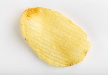 Crispy potato chips. Fast Food. Potatoes. Fatty unhealthy foods. corrugated chips