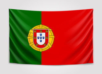 Obraz premium Hanging flag of Portugal. Portuguese Republic. National flag concept.
