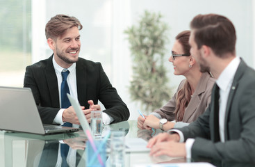 Photo of a young business team working in a modern office