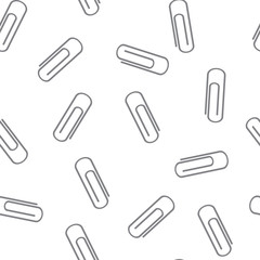 Seamless pattern from an office paper clip on a white background. 
