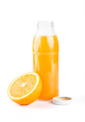 Orange juice. Isolated drink. A glass of orange juice and pieces of orange fruit isolated on white background. Citrus. Diet. Vitamins. Healthy food.