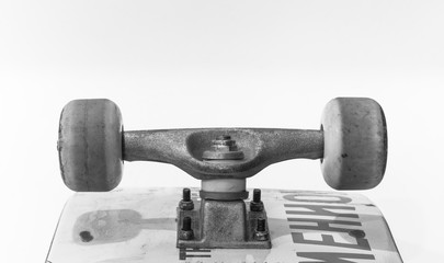 Skateboard isolated on white background. Black and white photography.