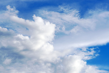 Naklejka na ściany i meble Blue sky with white clouds. Fresh air. Meteorology.