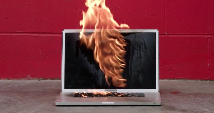 Laptop computer screen bursting into flames