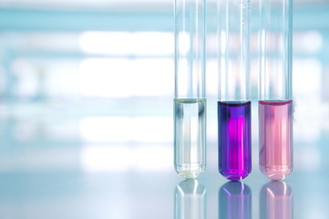 pink purple water of three test tube in science laboratory