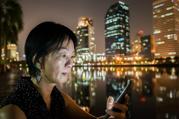 Fototapeta premium woman using cellphone