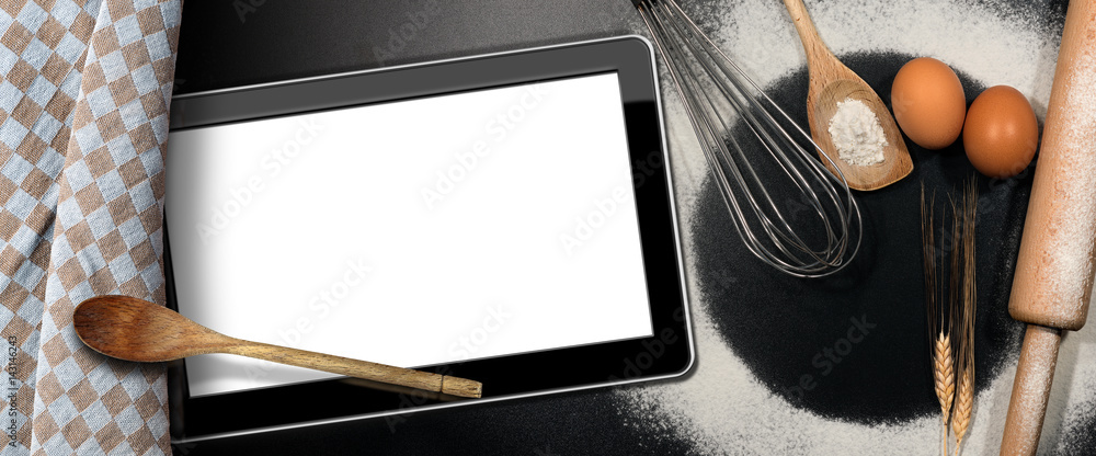 Poster tablet computer on a baking background