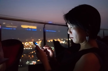 woman using mobile phone