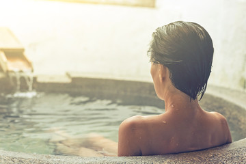 woman at hot spring pool