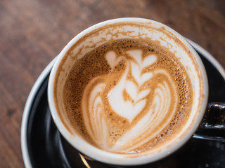 Art on hot coffee in cup
