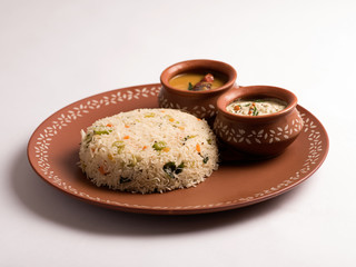 Sevai - coconut sevai with sambar and coconut chutney a traditional south Indian tiffin in plate
