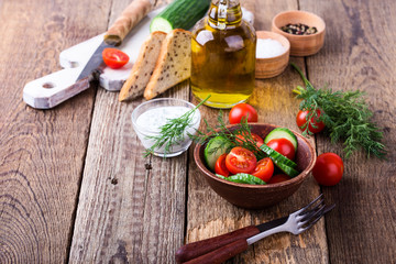 Salad of fresh tomato, cucumber and olive oil