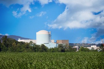 A nuclear power plant on a summer day. 