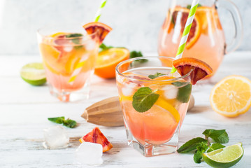 Homemade lemonade and ingredients. Citrus cold summer drink.