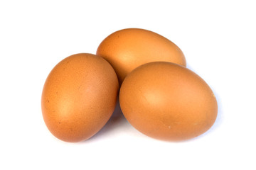 three eggs isolated on white background