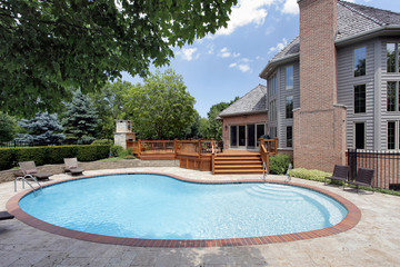 Swimming pool with wood deck