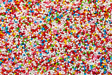 Multicoloured sweet sugar balls. Small ball pattern.