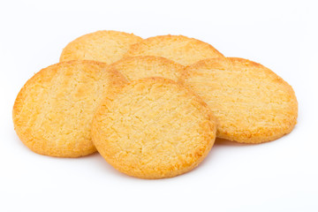 Stacked short pastry cookies isolated on white background.