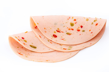 Sliced boiled ham sausage isolated on white background, top view. © gitusik