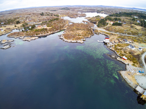 Fishing bay in early spring, Norwegian fjord from above