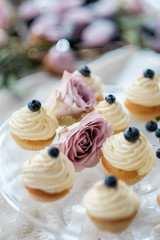 Traditional French desserts on a table in interior