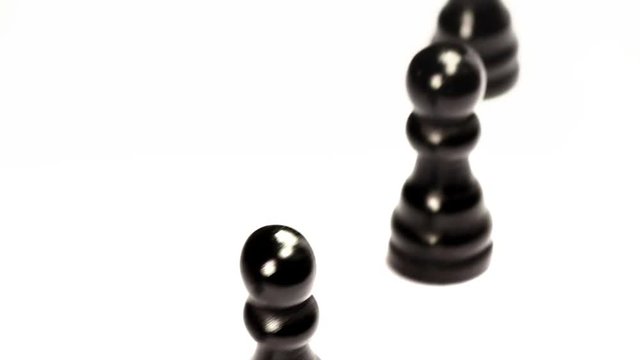 Black chess pieces crossing in a row. Chess set's march. Seamless, loop