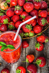 Fresh strawberry smoothie, summer drink, healthy antioxidant juice from fresh berry fruits