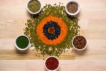 Spices  in plates and on wooden table