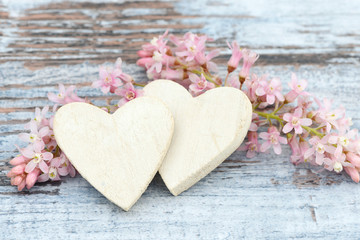 Plakat heart and flower lying on wood