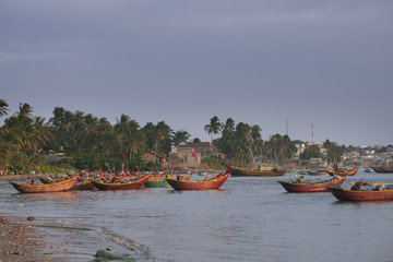 Vietnamese fishing village, Mui Ne, Vietnam, Southeast Asia. Landscape with sea and traditional colorful fishing boats