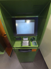 Cash dispenser for green money appearance from the top