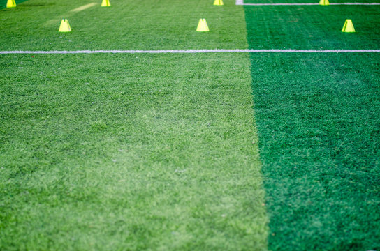 Artificial grass football field green close up