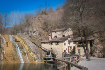 Old watermill tilt shift in springtime