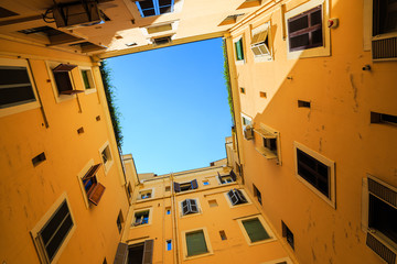 Architectural detail of an open courtyard in an building in Rome, Italy.