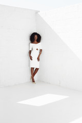 Obraz na płótnie Canvas Stunning model in white dress, portrait