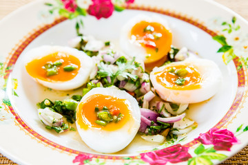 medium-boiled eggs in plate