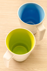 Coffee cup on wooden background