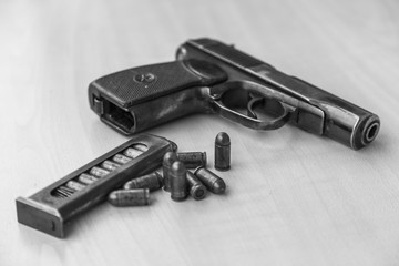 Military combat pistol in black and white