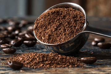 Ground Coffee Spilled from a Coffee Scoop