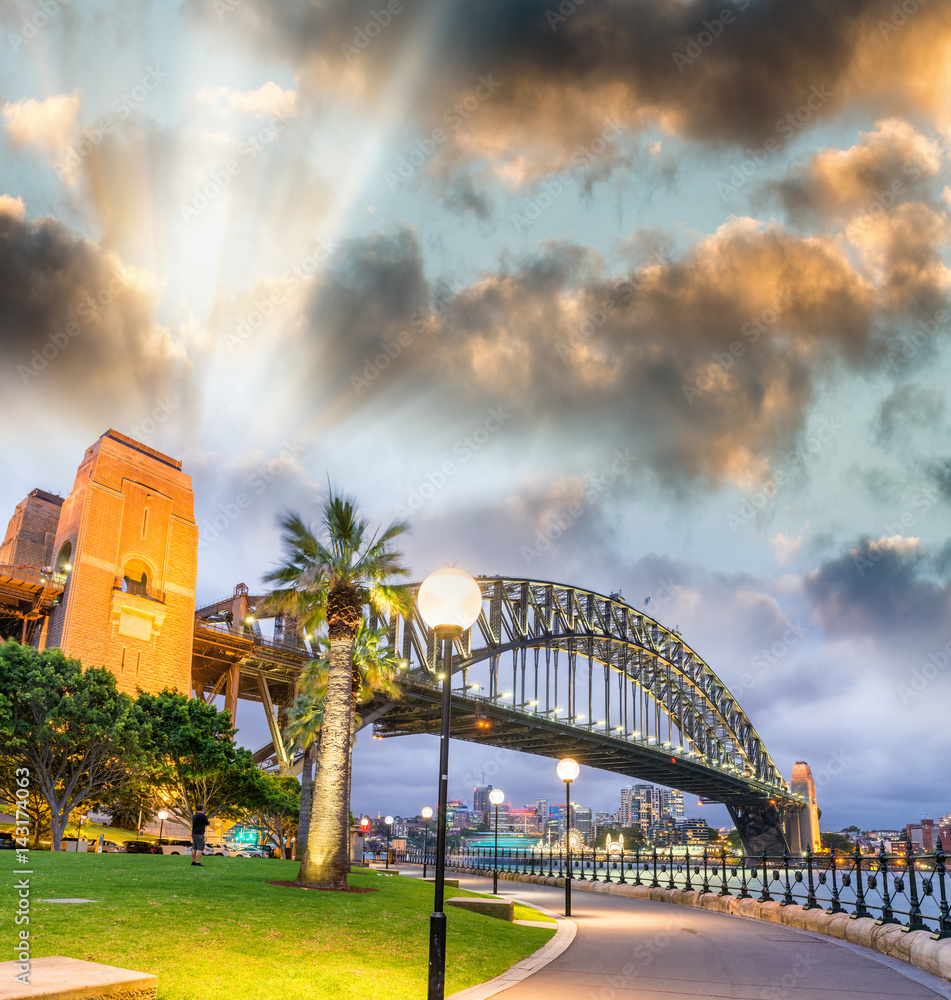 Wall mural Beautiful view of Sydney Harbour Bridge with sunset sky, Australia