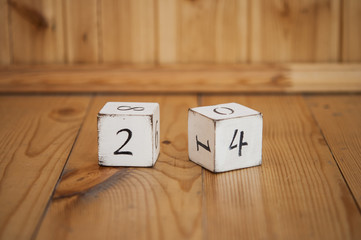 Wooden cube with the number