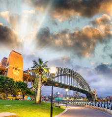 Beautiful view of Sydney Harbour Bridge with sunset sky, Australia