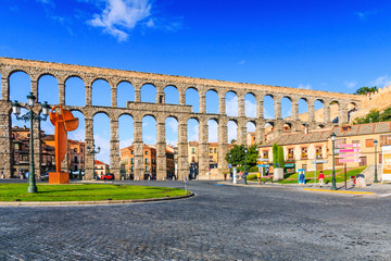 Segovia, Spain at the ancient Roman aqueduct. - obrazy, fototapety, plakaty