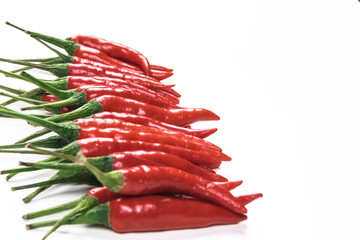 Red hot chilli peppers on white background