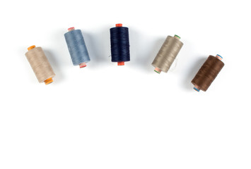Spools with color threads.