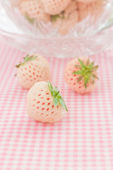 Pineberries or Hula Berry a hybrid strawberry with a pineapple flavor white flesh and red seeds